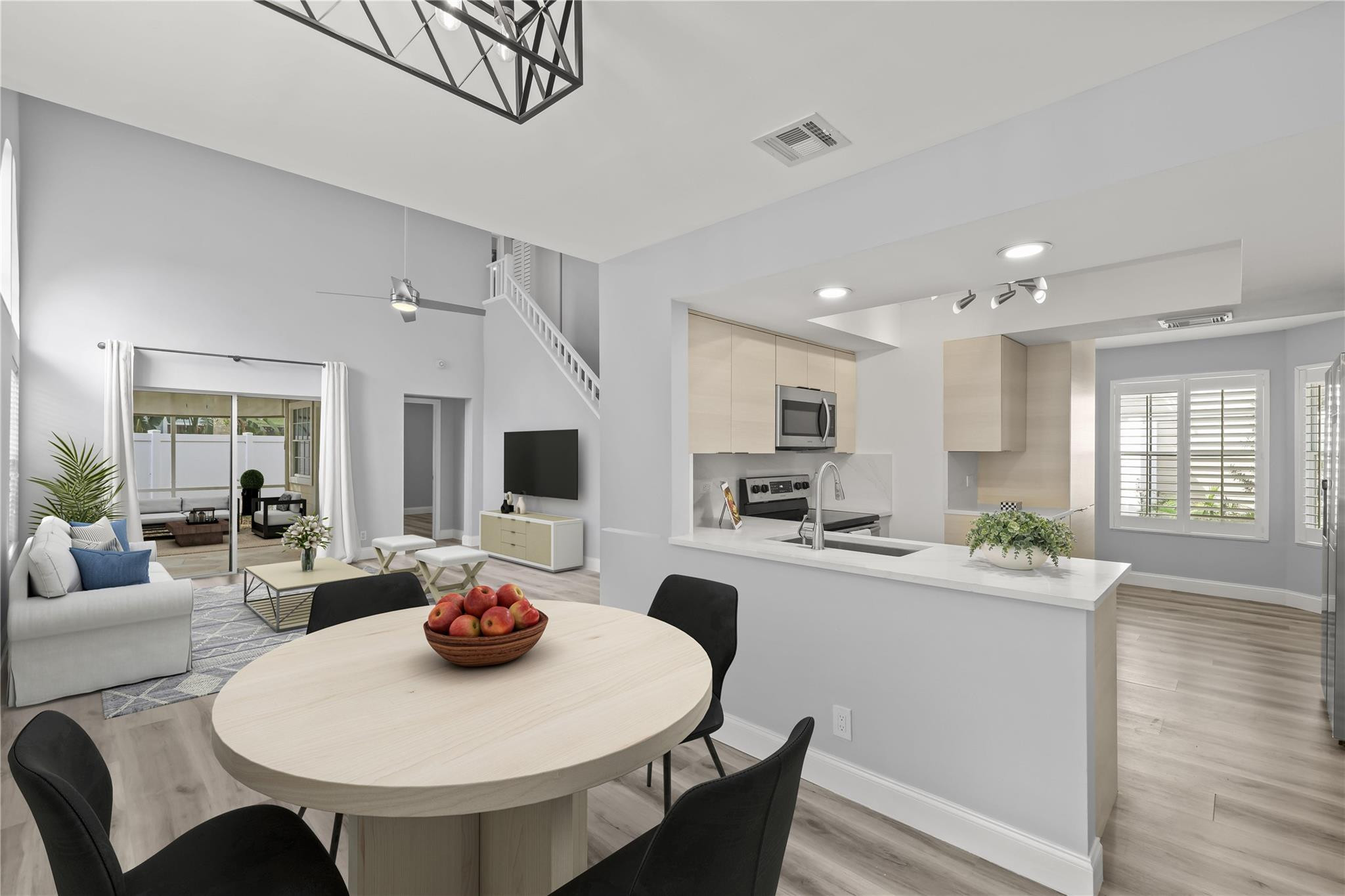 5339 Park Pl Circle Boca Raton, FL 33431 - Photo 11 of 46 a view of a dining room with furniture and wooden floor