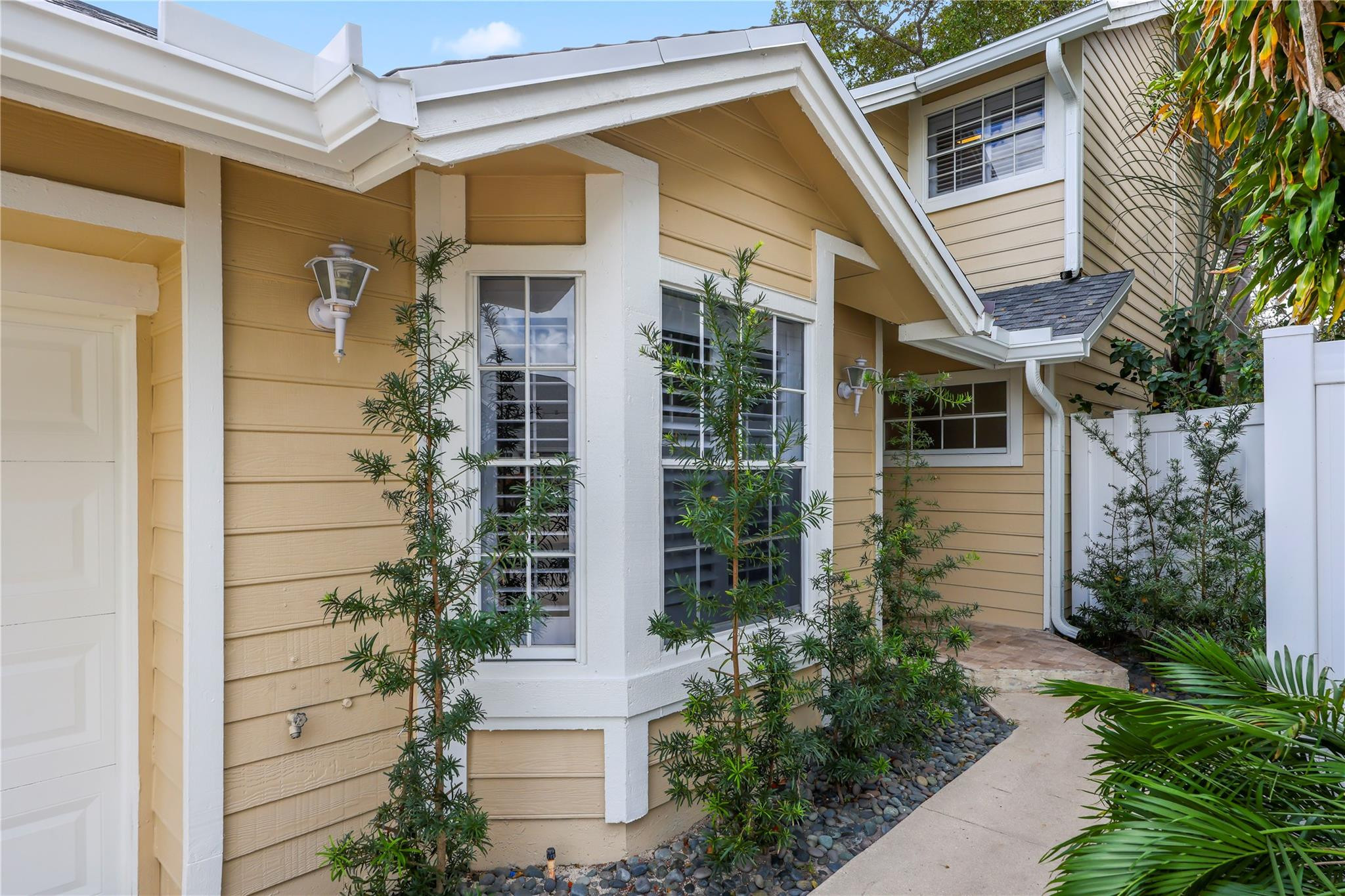 5339 Park Pl Circle Boca Raton, FL 33431 - Photo 2 of 46 a front view of a house with a yard
