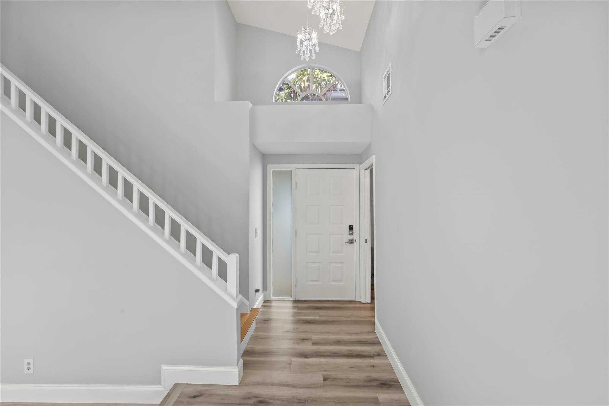 5339 Park Pl Circle Boca Raton, FL 33431 - Photo 22 of 46 a view of entryway and hall with wooden floor
