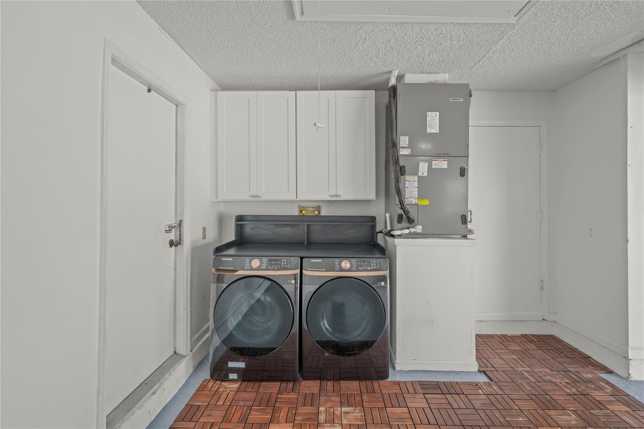 5339 Park Pl Circle Boca Raton, FL 33431 - Photo 31 of 46 a utility room with sink dryer and washer