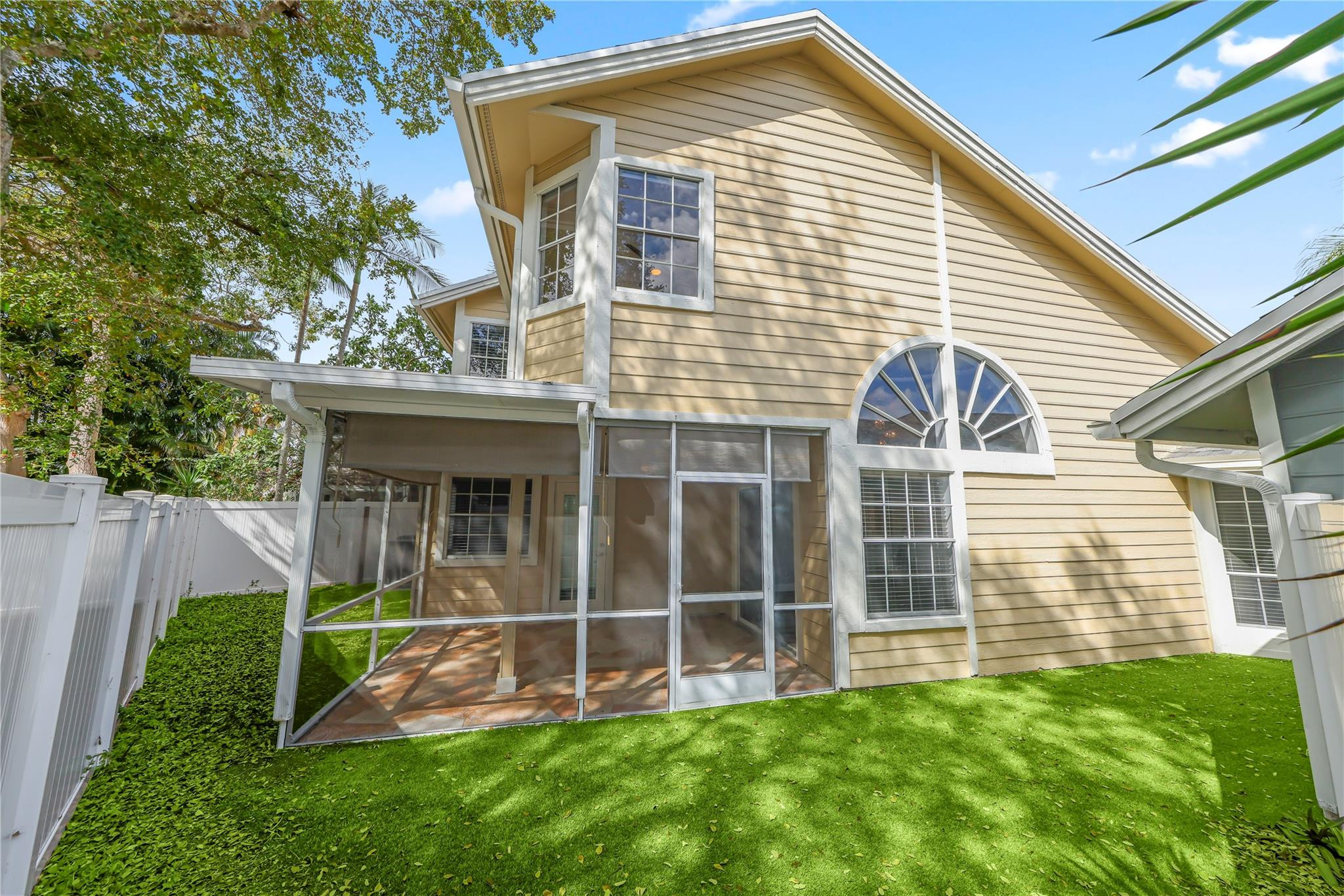 5339 Park Pl Circle Boca Raton, FL 33431 - Photo 36 of 46 a front view of a house with a yard