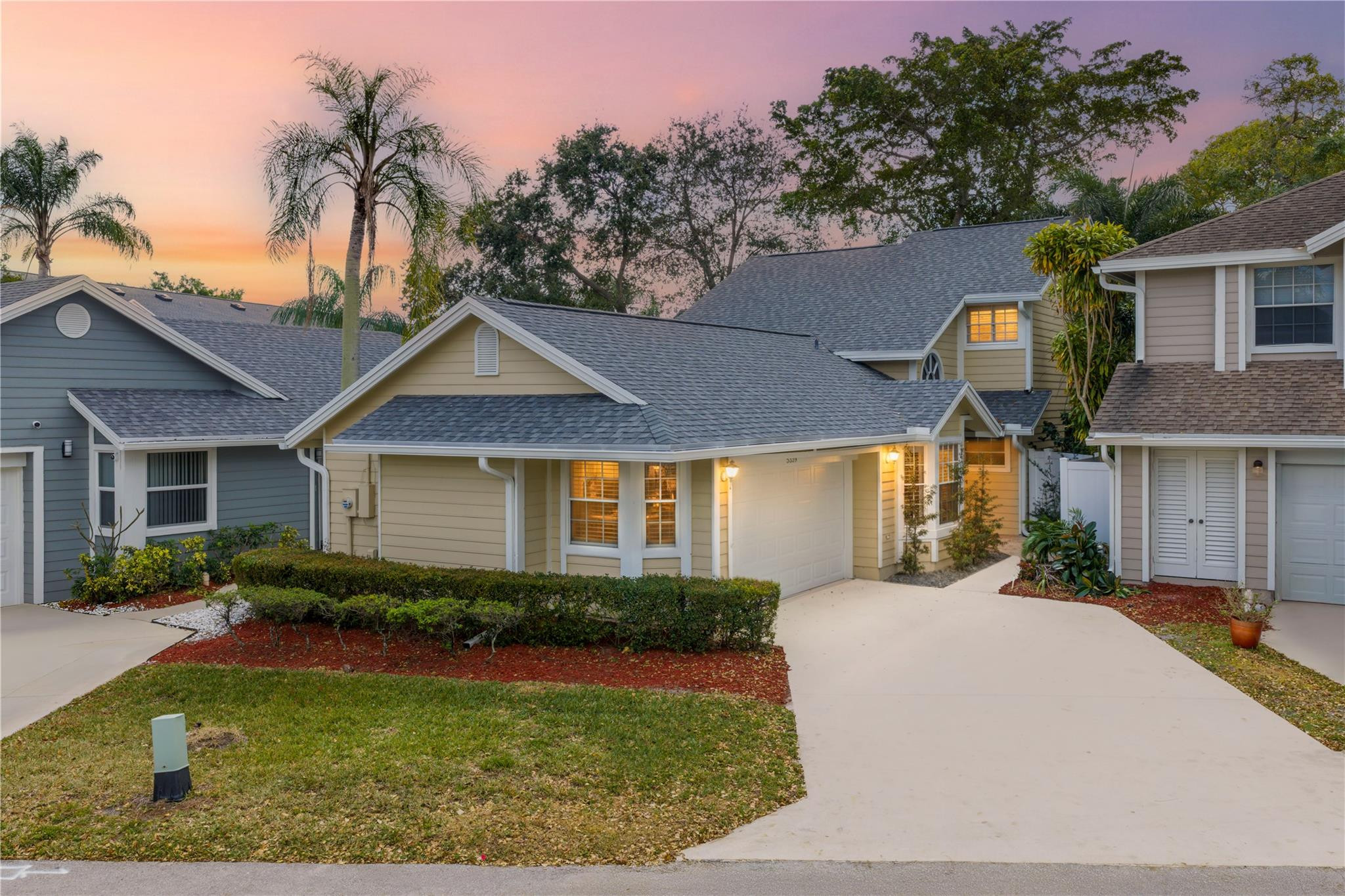 5339 Park Pl Circle Boca Raton, FL 33431 - Photo 46 of 46 a front view of a house with garden