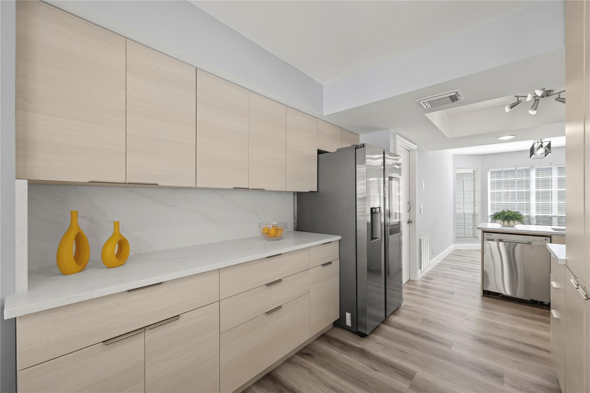 5339 Park Pl Circle Boca Raton, FL 33431 - Photo 5 of 46 a kitchen with a sink and refrigerator