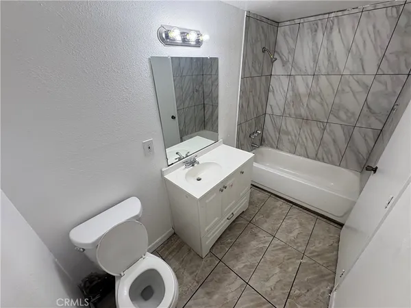 an empty room with mirror