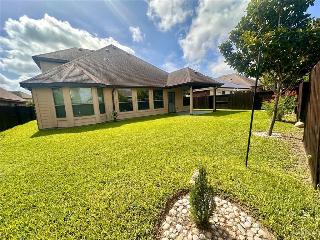 3900 Santa Maria Street Mission, TX 78572 - Photo 28 of 31 a view of a house with pool and a yard