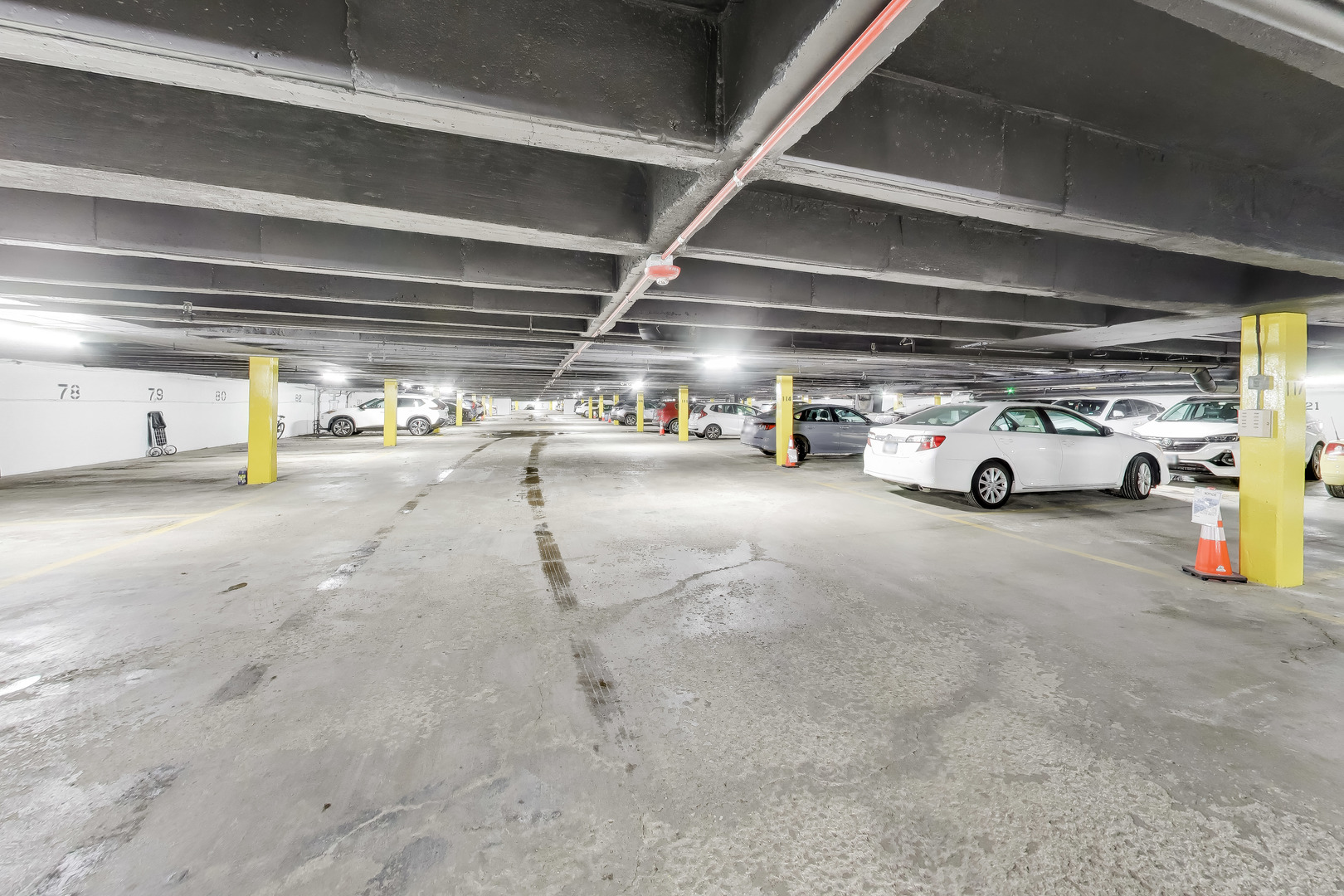40 North Tower Road, Unit 16N Oak Brook, IL 60523 - Photo 28 of 31 a view of parking garage with cars