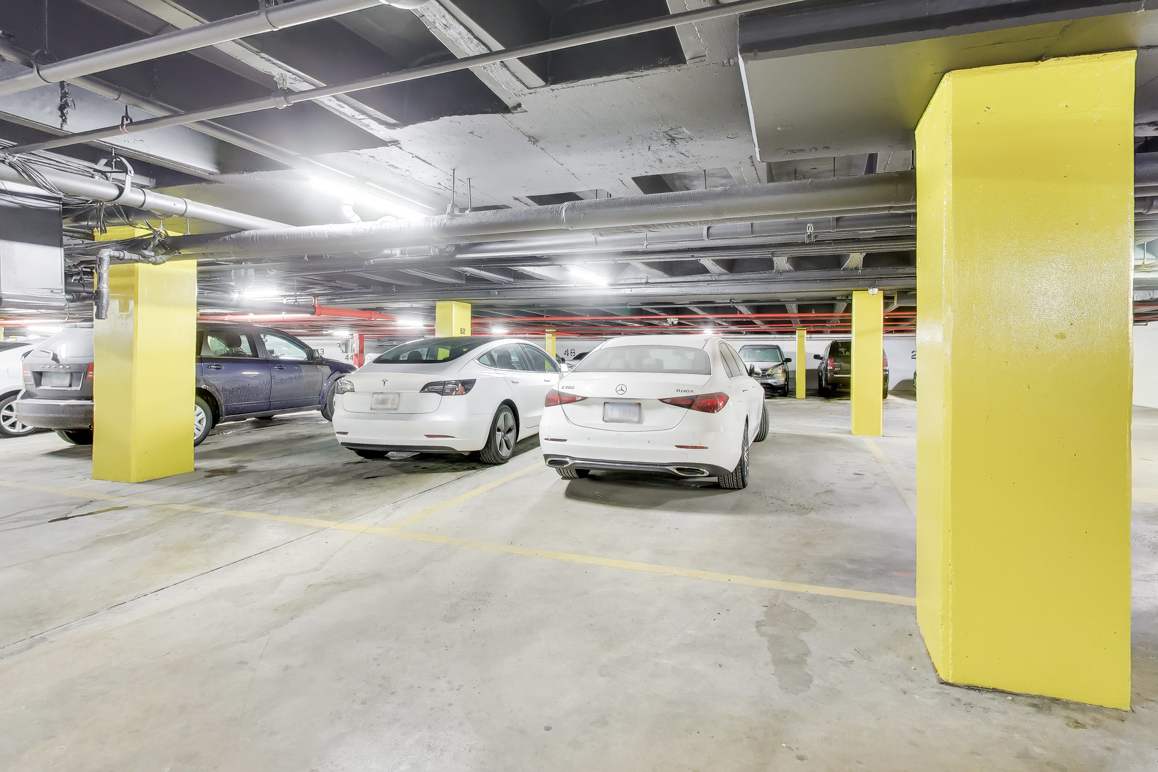 40 North Tower Road, Unit 16N Oak Brook, IL 60523 - Photo 29 of 31 a view of parking garage with cars