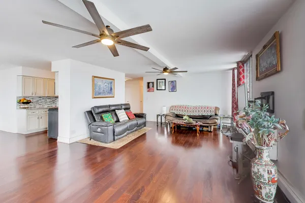 a living room with furniture and a table