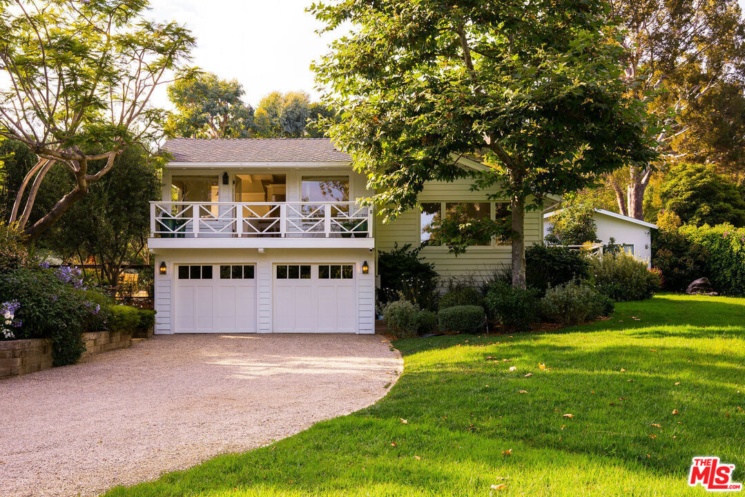 6456 Sycamore Meadows Drive Malibu, CA 90265 - Photo 4 of 34 a front view of house with yard and green space