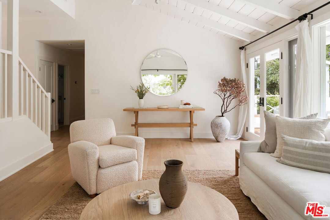 6456 Sycamore Meadows Drive Malibu, CA 90265 - Photo 8 of 34 a living room with furniture and a window