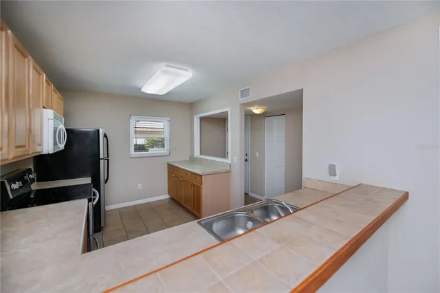 a room with a bed and furniture