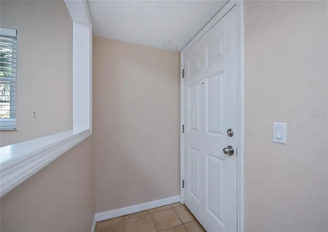 a view of a hallway with closet