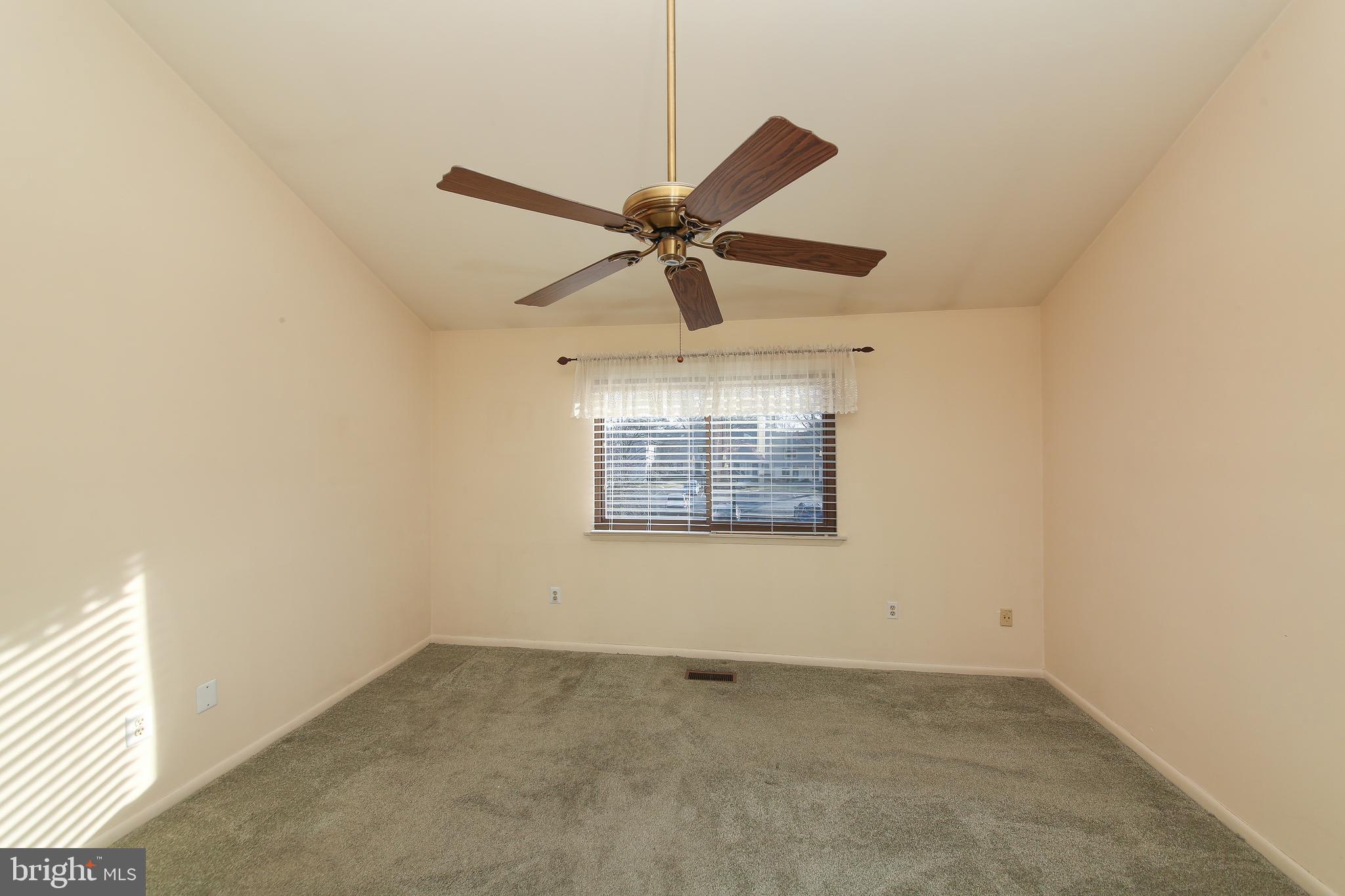 16 Ember Lane Horsham, PA 19044 - Photo 14 of 27 an empty room with a window and a fan