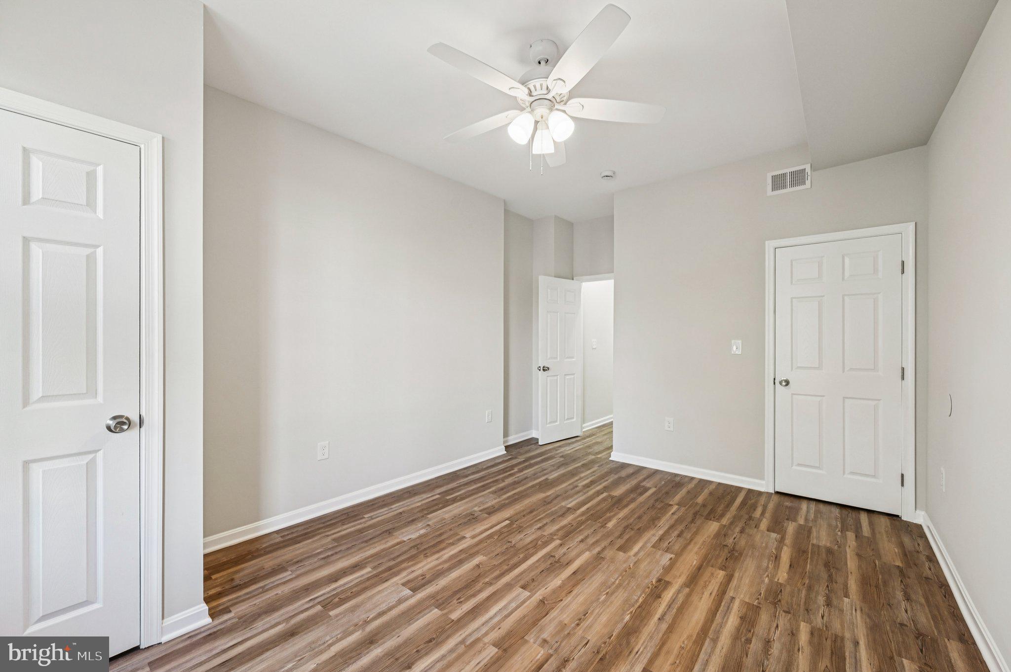 750 Reservoir Street, Unit B Baltimore, MD 21217 - Photo 18 of 25 a view of a room with wooden floor