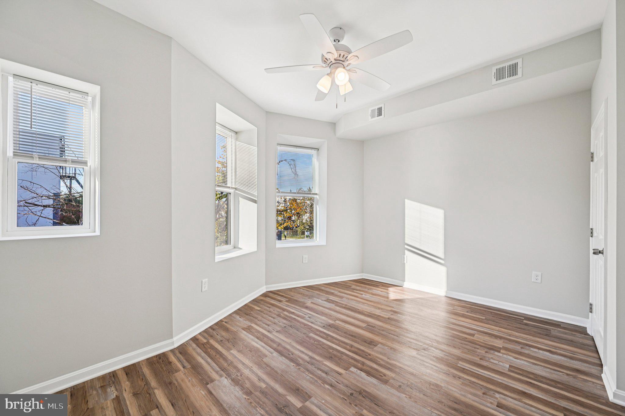 750 Reservoir Street, Unit B Baltimore, MD 21217 - Photo 21 of 25 a view of empty room with wooden floor