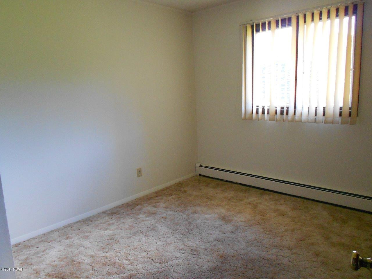 369 Roemerville Road Greentown, PA 18426 - Photo 33 of 45 an empty room with a window