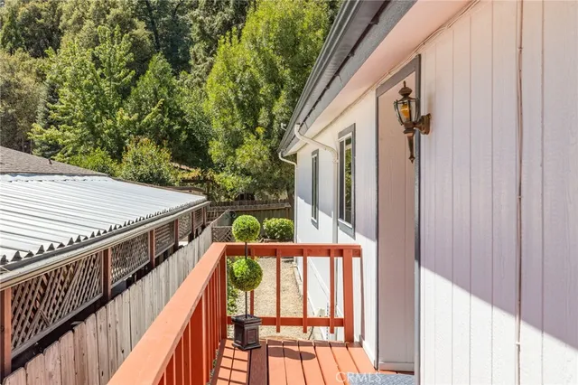 a balcony view with an outdoor seating