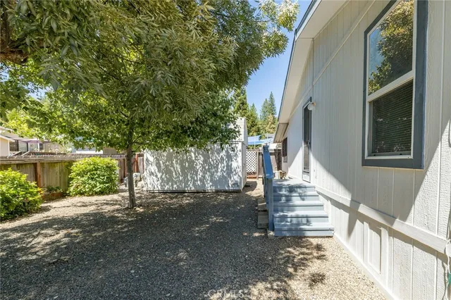 a view of a house with a street