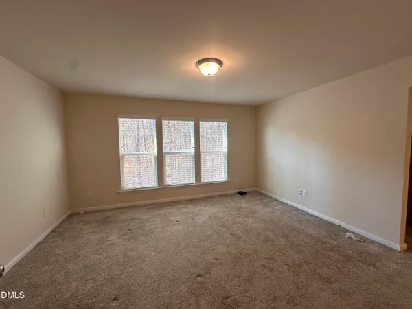 an empty room with a window