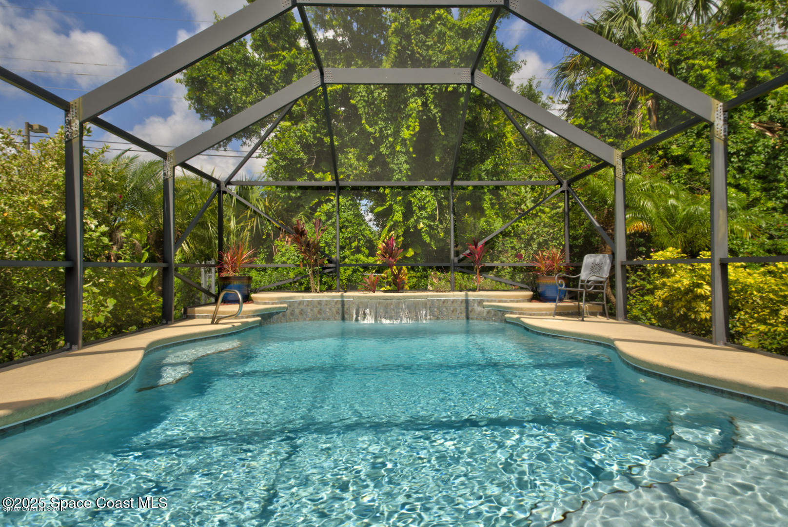165 Virginia Road Melbourne, FL 32904 - Photo 20 of 32 a view of yard with swimming pool