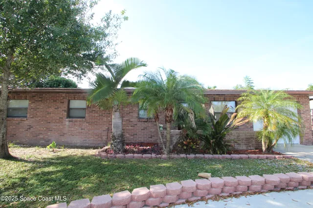 front view of house with a yard