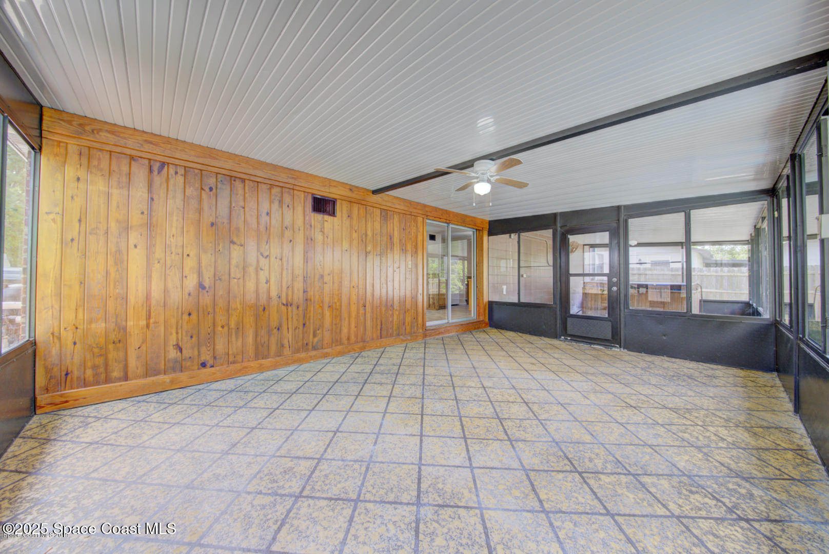 165 Virginia Road Melbourne, FL 32904 - Photo 26 of 32 a view of an empty room with a window