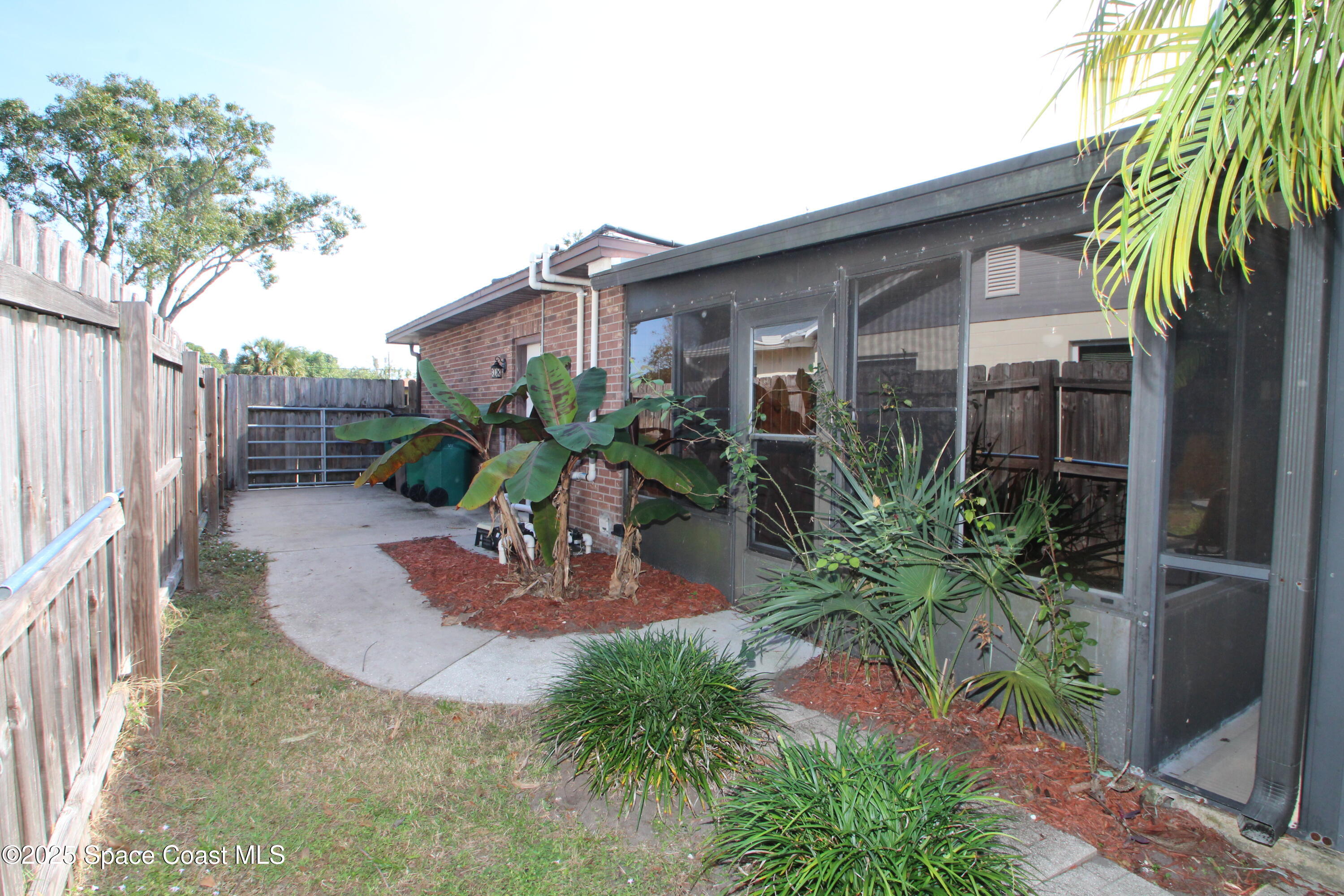 165 Virginia Road Melbourne, FL 32904 - Photo 31 of 32 a view of outdoor space yard and porch