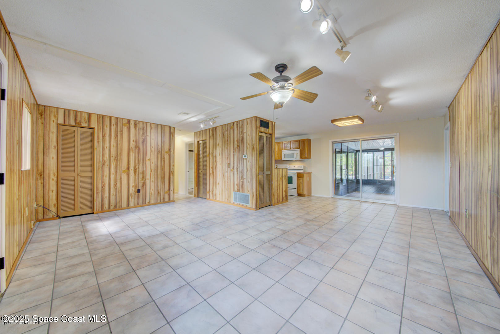 165 Virginia Road Melbourne, FL 32904 - Photo 6 of 32 a view of an empty room with a window