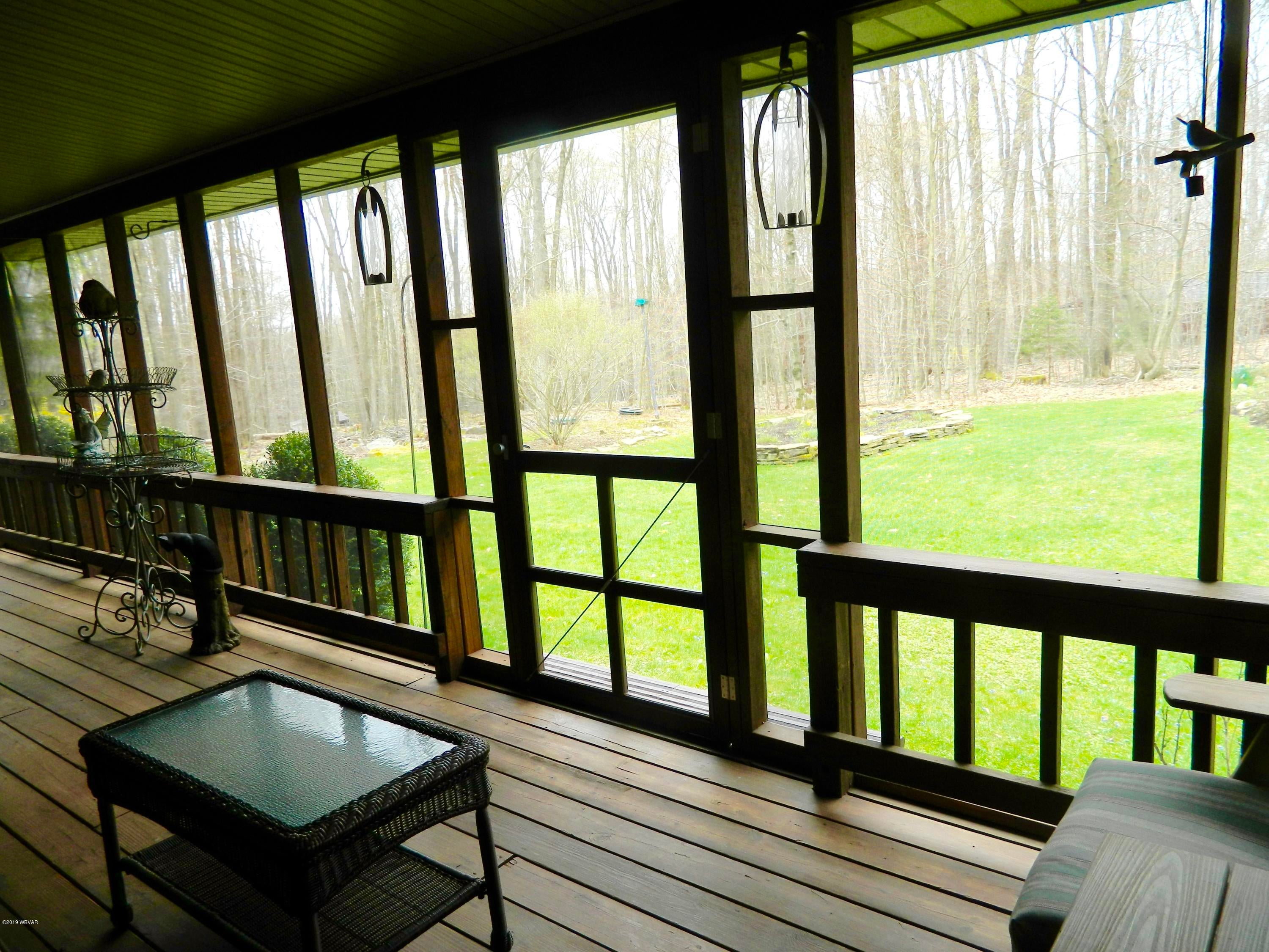 288 Rock Ledge Road Dushore, PA 18614 - Photo 33 of 42 View from Screened-In Porch