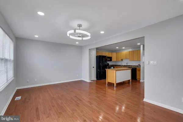 a view of kitchen with sink and microwave