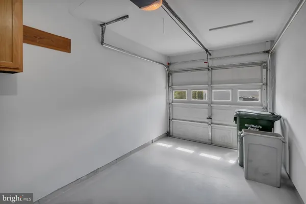 a view of a storage & utility room with washer and dryer