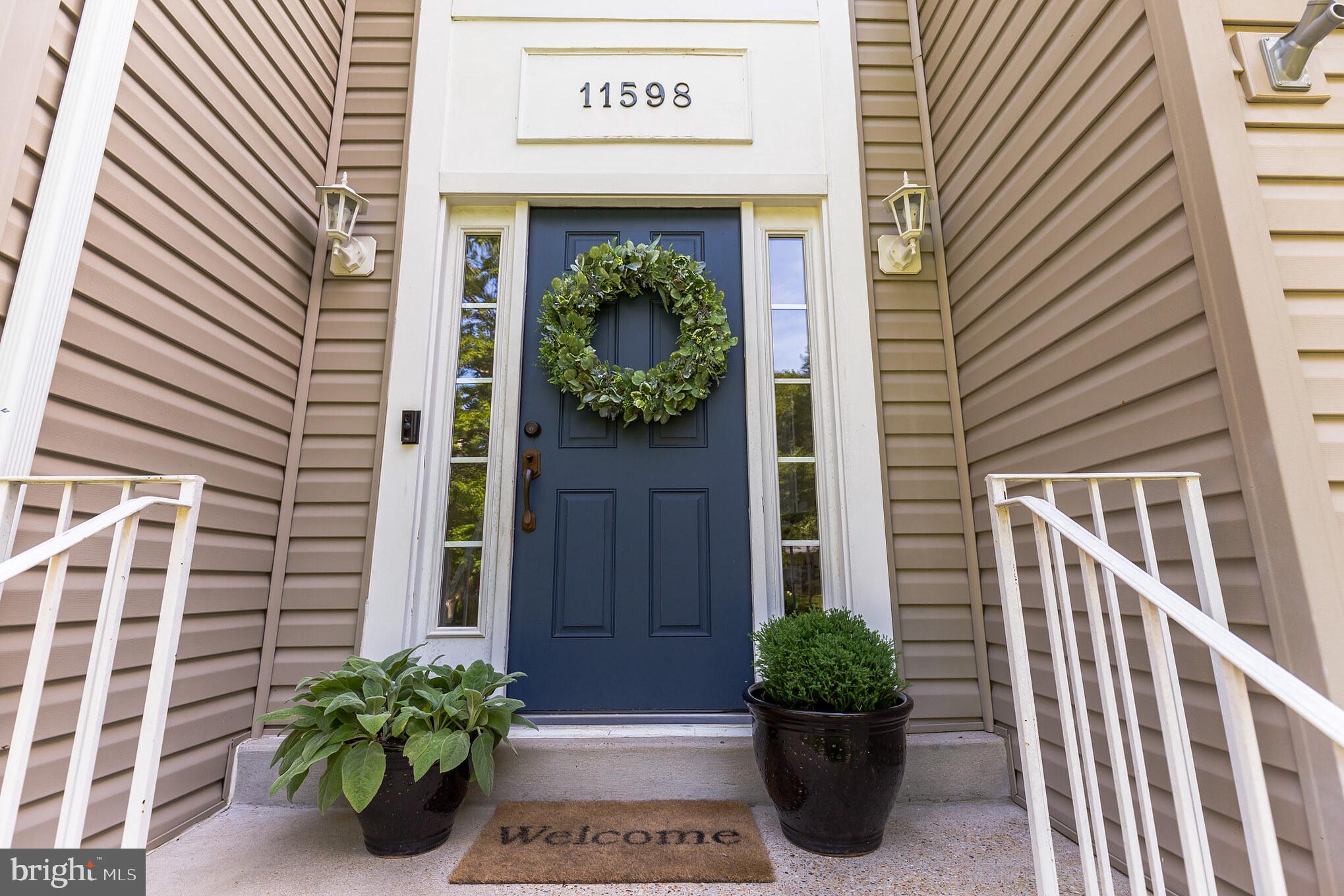 11598 Big Sandy Run Road Lusby, MD 20657 - Photo 2 of 30 a view of a entryway door front of house