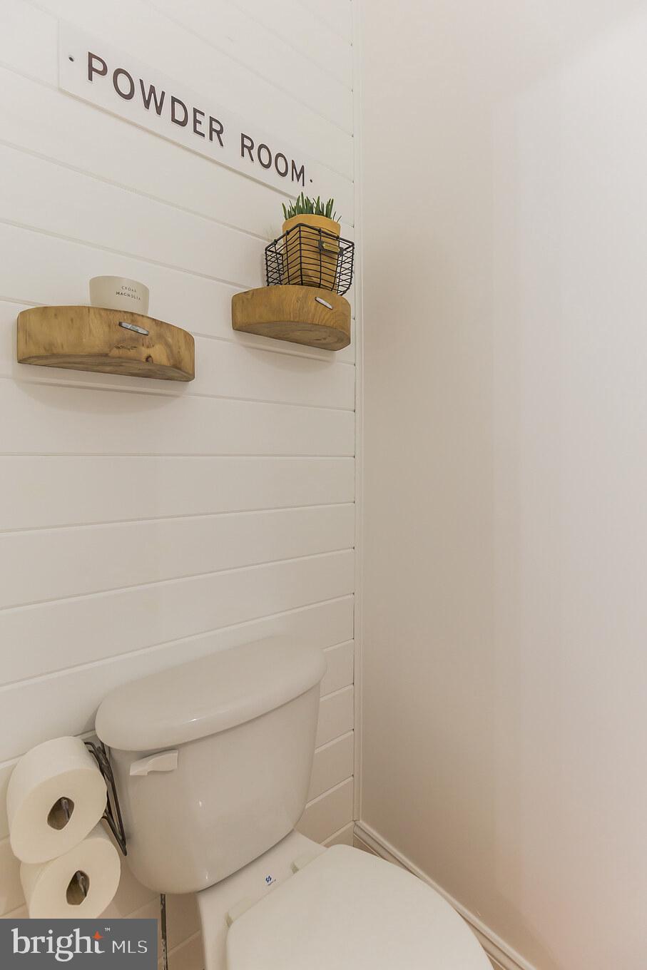 11598 Big Sandy Run Road Lusby, MD 20657 - Photo 11 of 30 a bathroom with a toilet and a sink