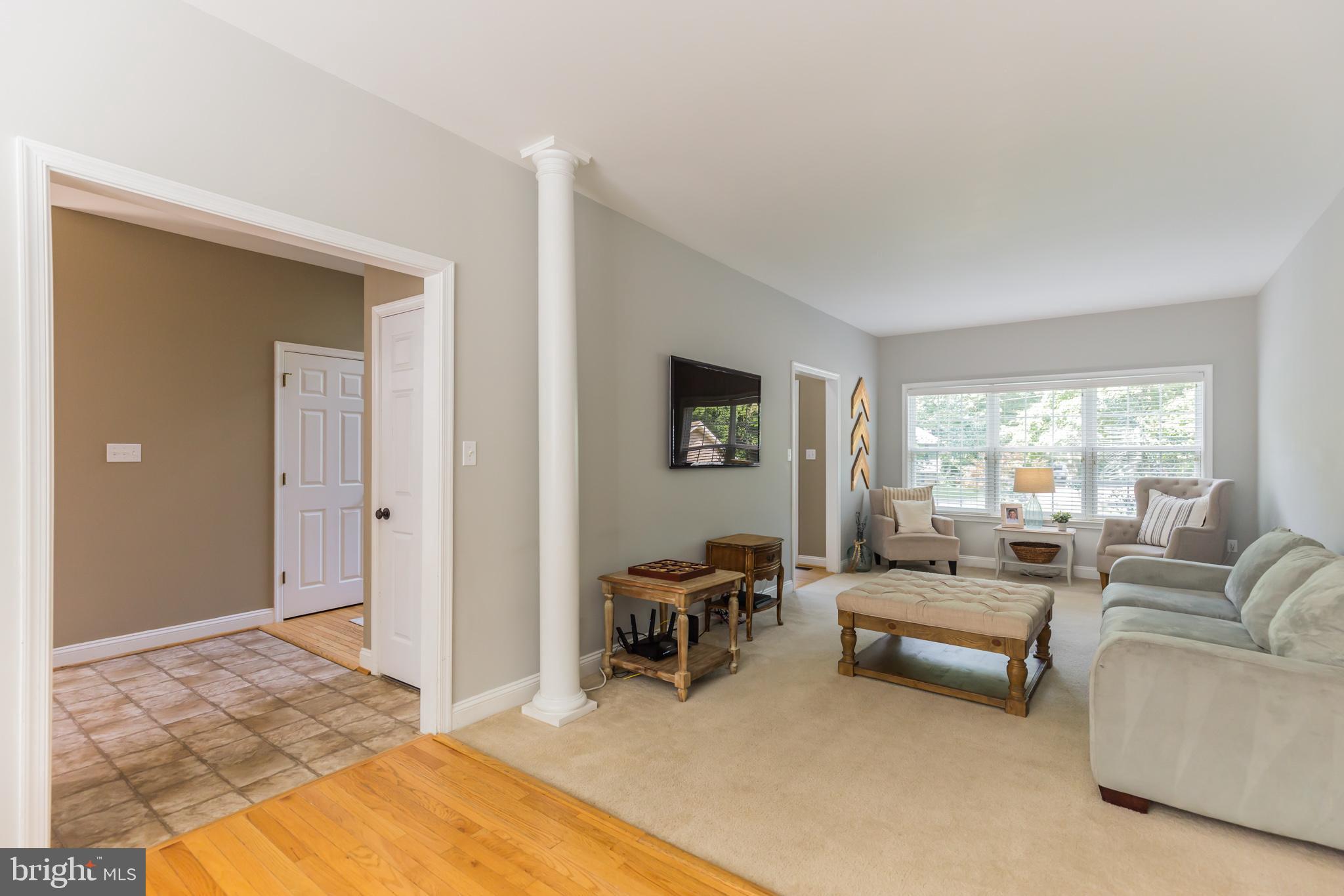 11598 Big Sandy Run Road Lusby, MD 20657 - Photo 14 of 30 a living room with furniture and a flat screen tv