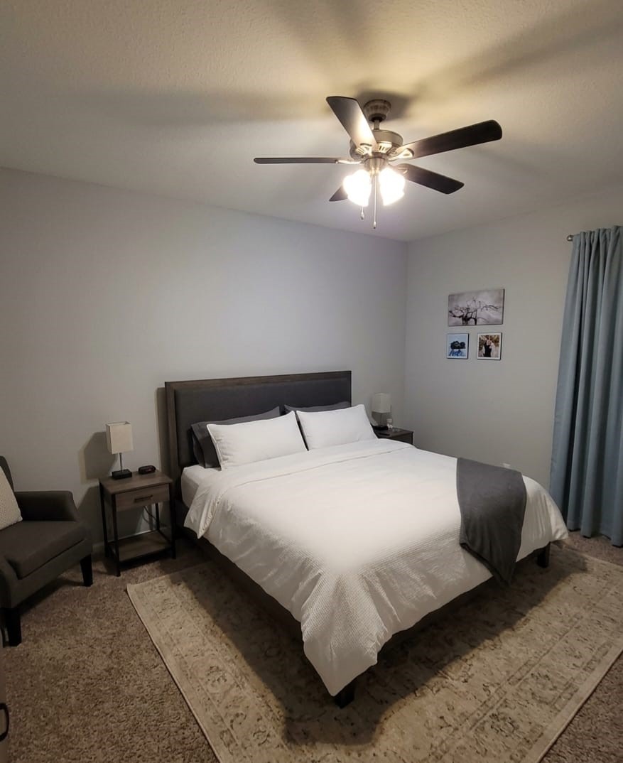 16903 Ridgemeadow Court Houston, TX 77083 - Photo 2 of 6 a bedroom with bed and a window