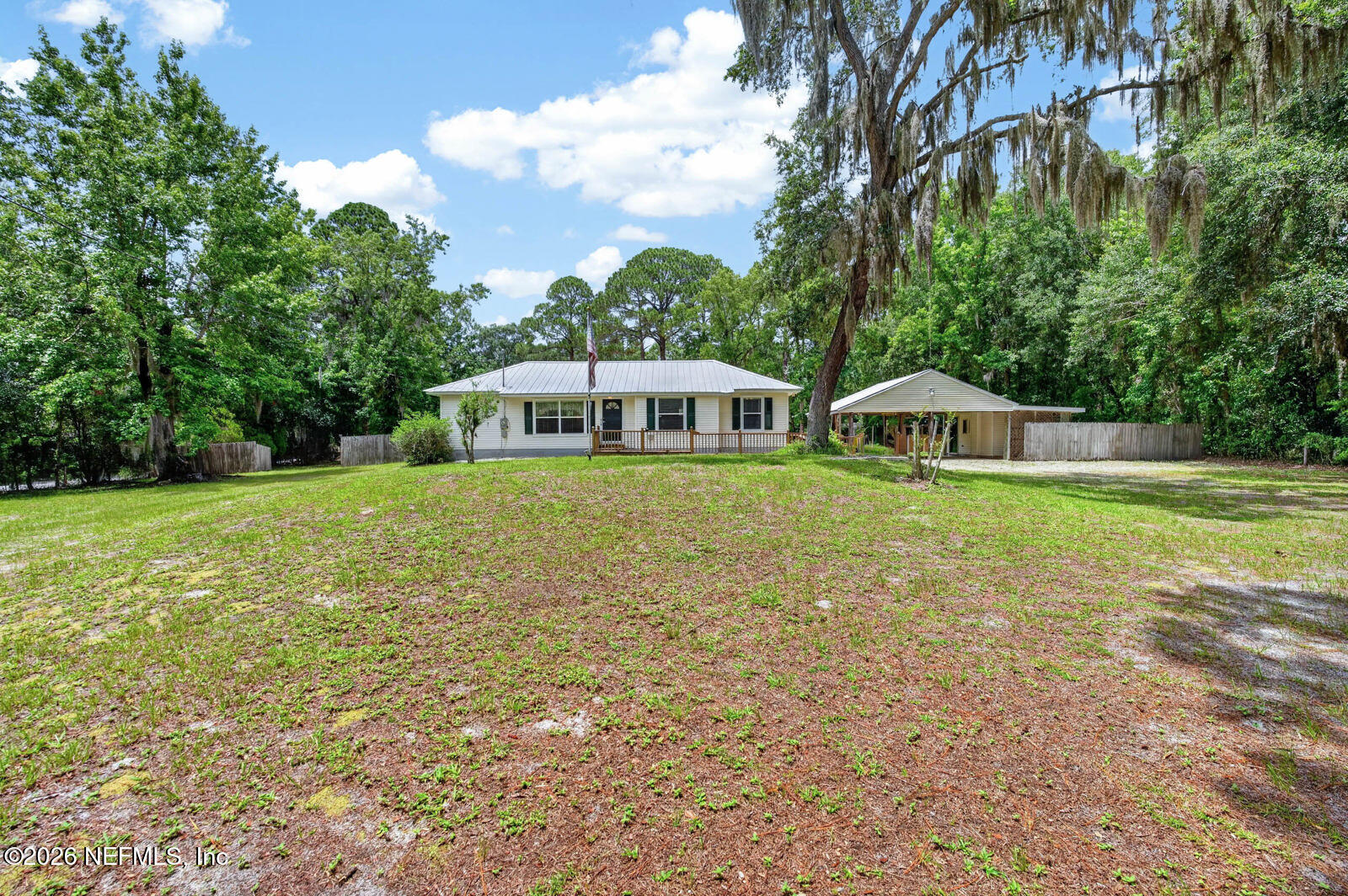 1950 Lightsey Road St. Augustine, FL 32084 - Photo 4 of 57 a view of a house with yard and sitting area