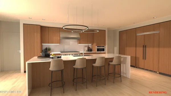 a kitchen with a sink and chairs