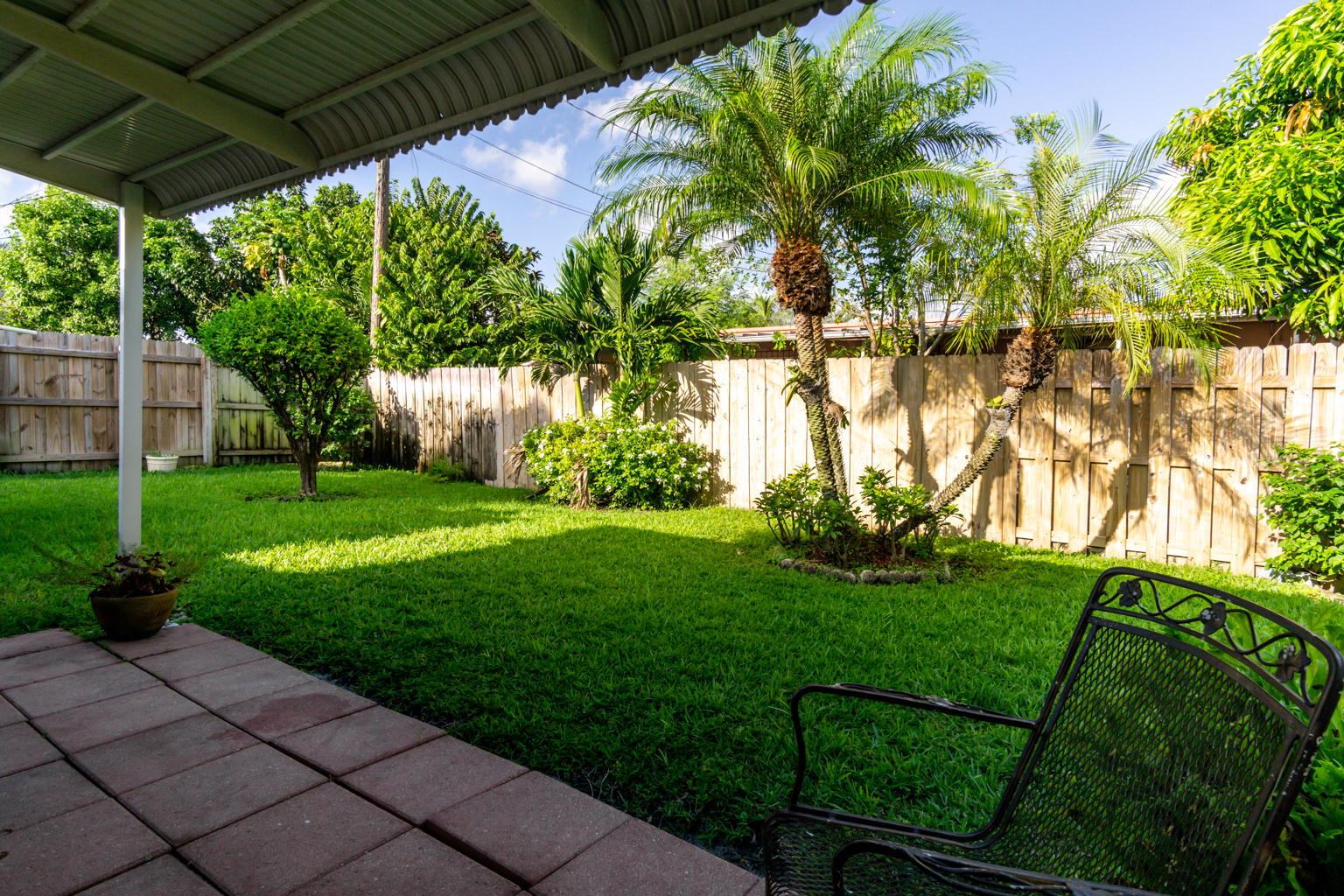 43 Andros Road Palm Springs, FL 33461 - Photo 8 of 23 a view of backyard with green space