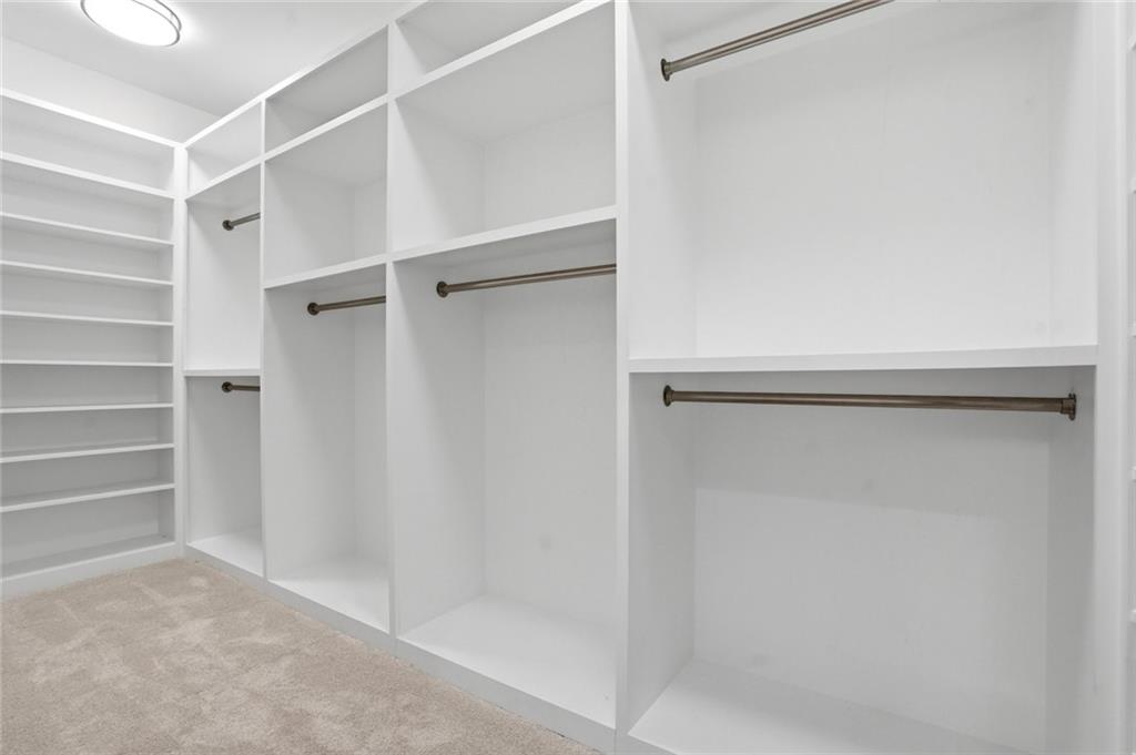 2415 West Rugby Avenue Atlanta, GA 30337 - Photo 19 of 40 a view of an empty walk in closet