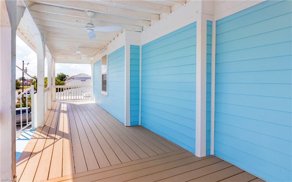 12277 Boat Shell Drive Matlacha Isles, FL 33991 - Photo 41 of 46 a view of a hallway with wooden floor