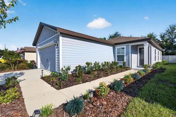 a front view of house with a yard