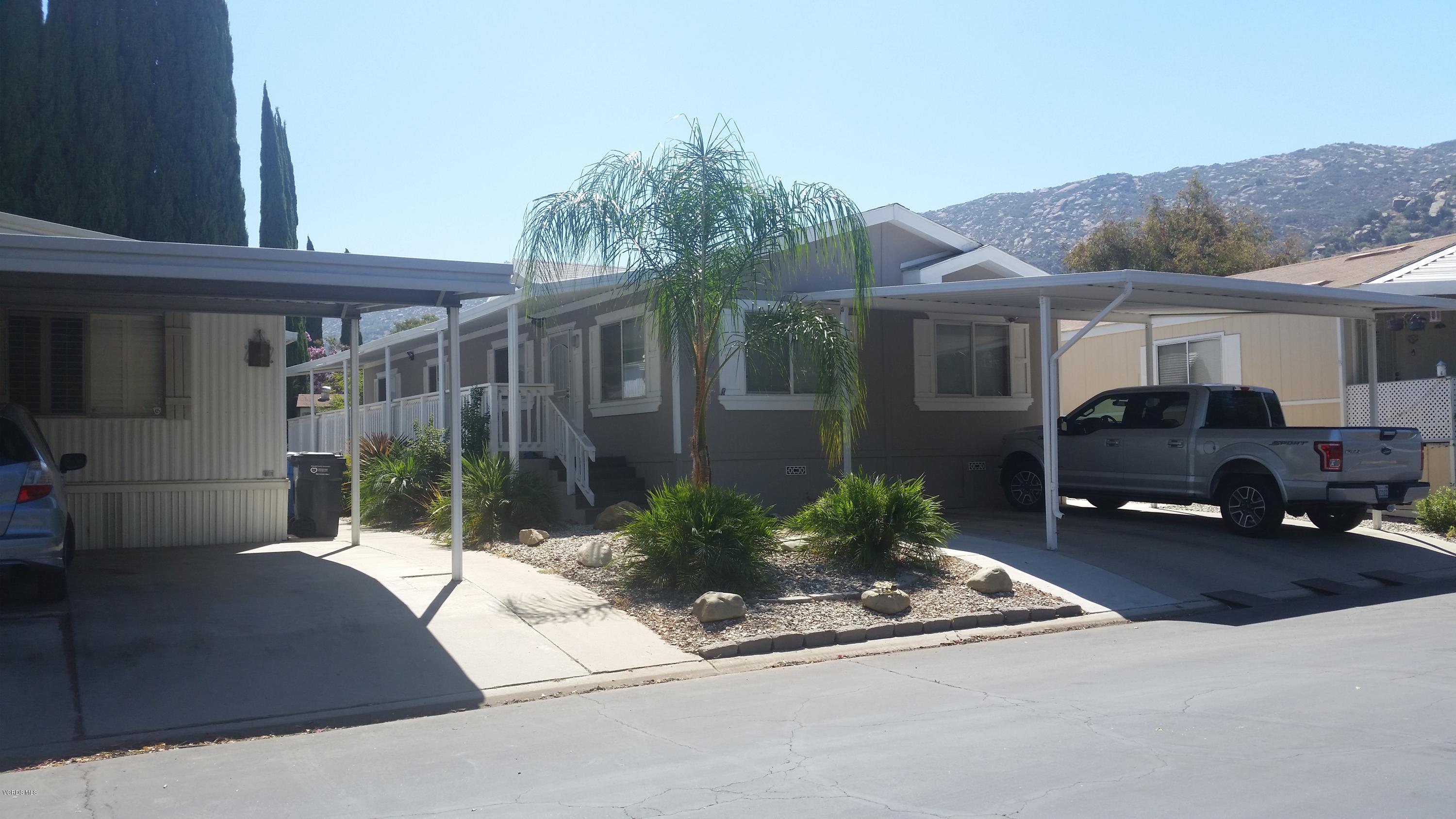 6480 Katherine Road, Unit 23 Simi Valley, CA 93063 - Photo 2 of 37 a view of a house with a patio
