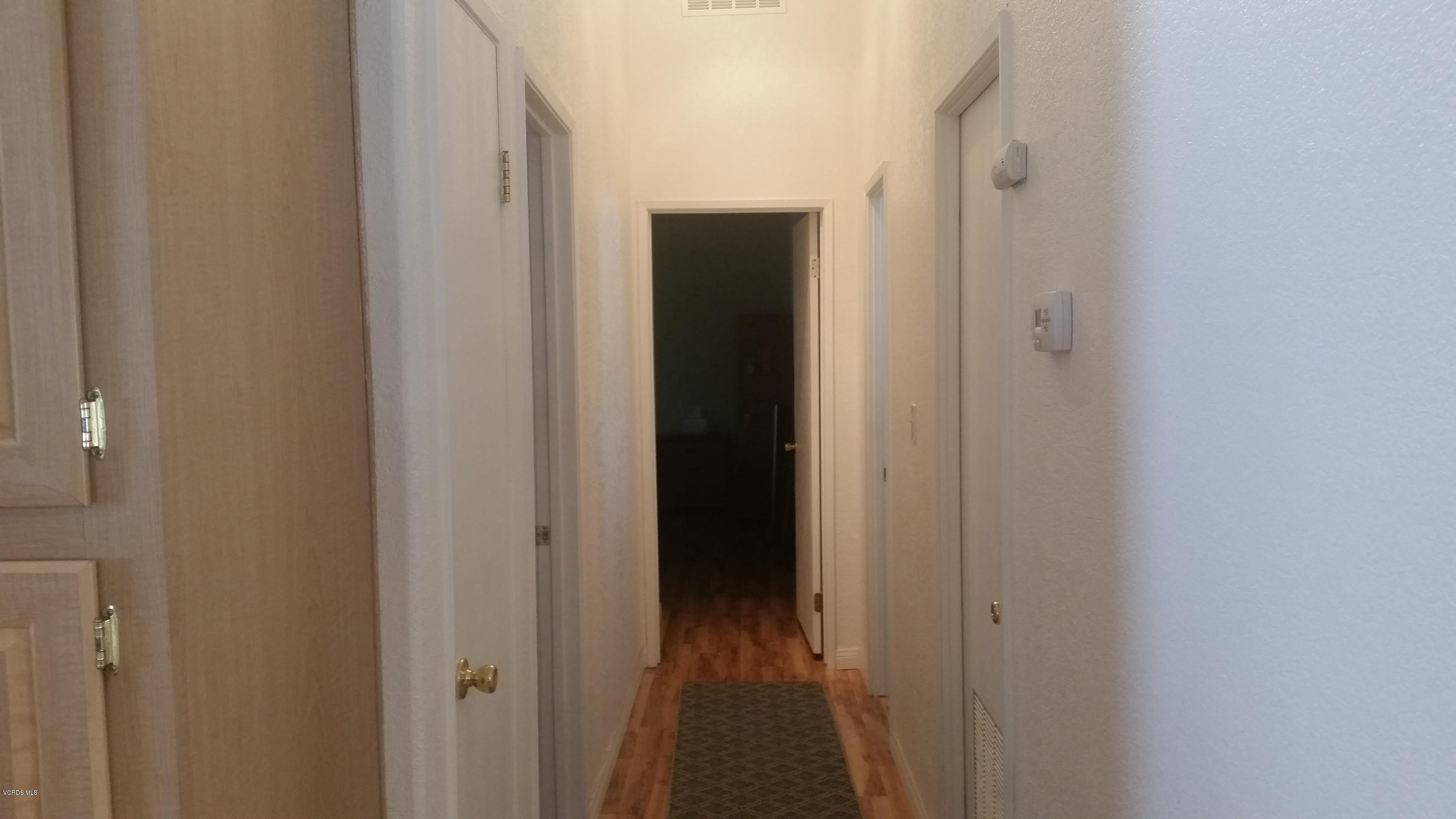 6480 Katherine Road, Unit 23 Simi Valley, CA 93063 - Photo 17 of 37 a view of a hallway
