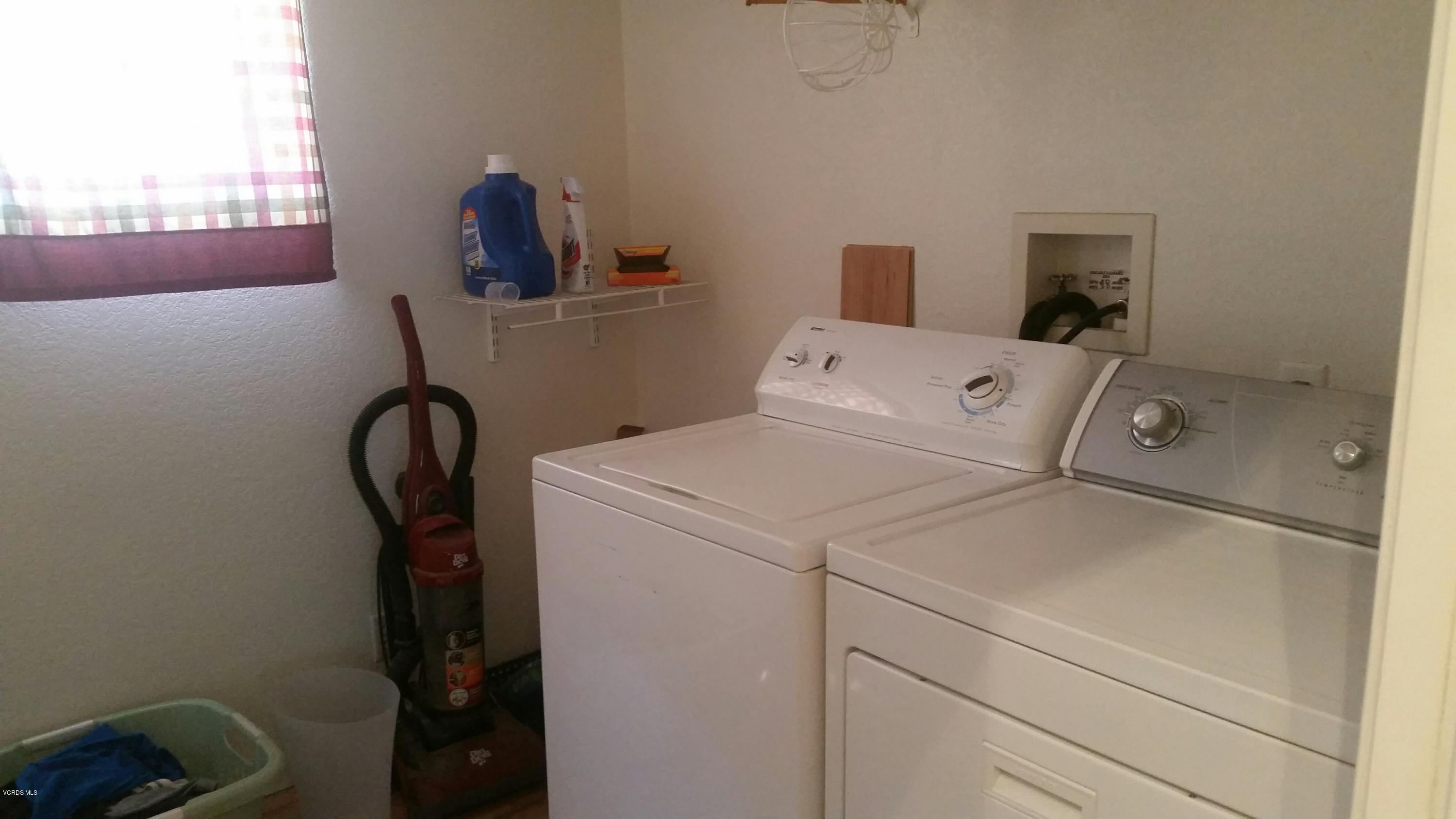6480 Katherine Road, Unit 23 Simi Valley, CA 93063 - Photo 18 of 37 a utility room with dryer and washer