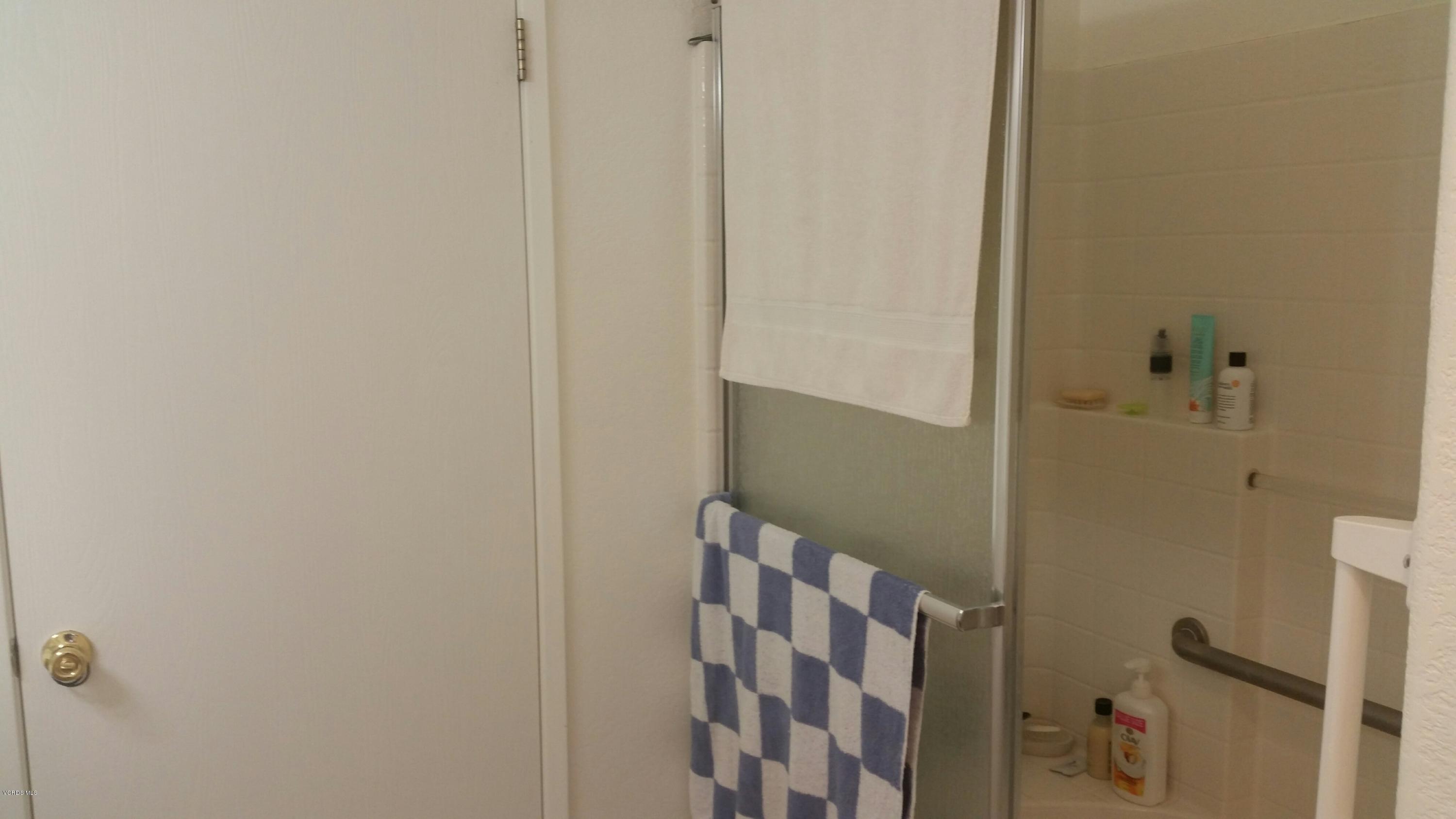 6480 Katherine Road, Unit 23 Simi Valley, CA 93063 - Photo 31 of 37 a bathroom with a shower
