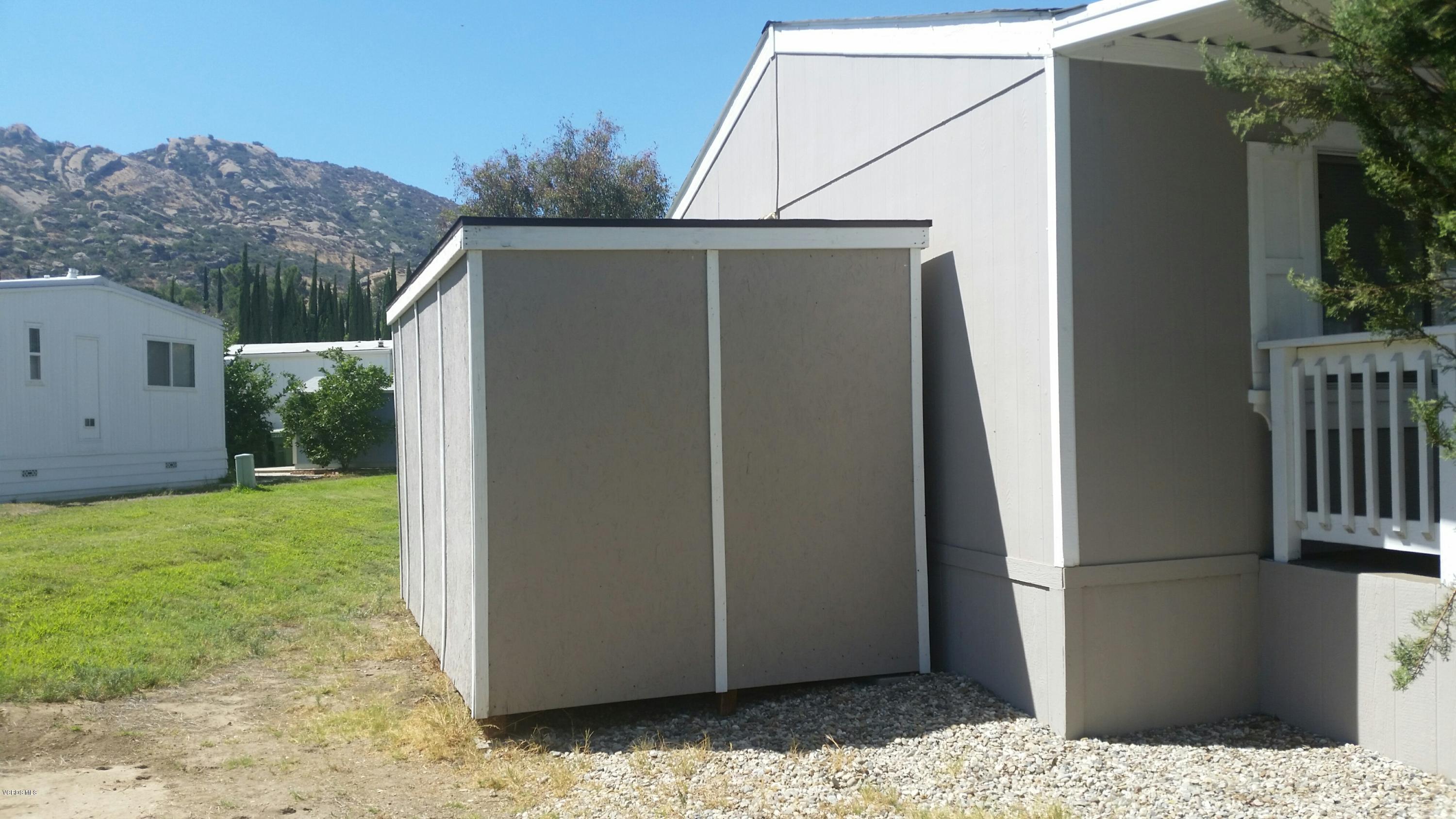 6480 Katherine Road, Unit 23 Simi Valley, CA 93063 - Photo 10 of 37 a backyard of a house