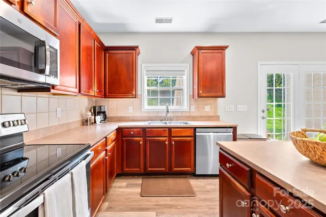 a room with furniture and air hockey table