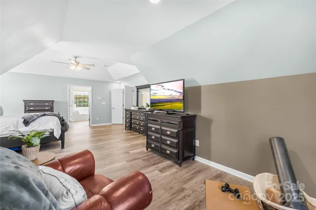 a view of a kitchen cabinets and wooden floor