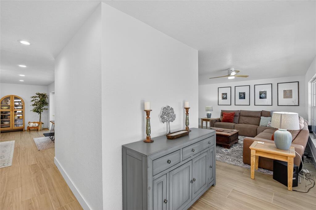 6337 Cocoa Lane Apollo Beach, FL 33572 - Photo 11 of 39 a living room with furniture and wooden floor