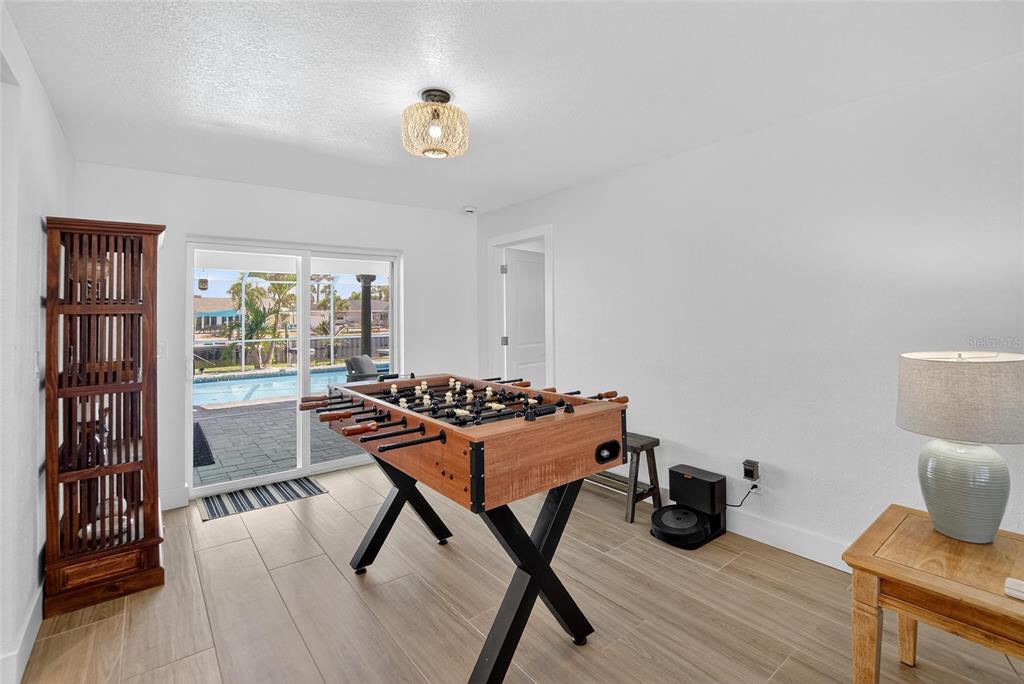 6337 Cocoa Lane Apollo Beach, FL 33572 - Photo 14 of 39 a bedroom with furniture and a window